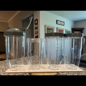 NutriBullet 900 Series Magic Bullet Blender Cups and Extra Accessories.